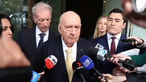 Sex Abuse Charges Against Prominent Australian Broadcaster Reduced